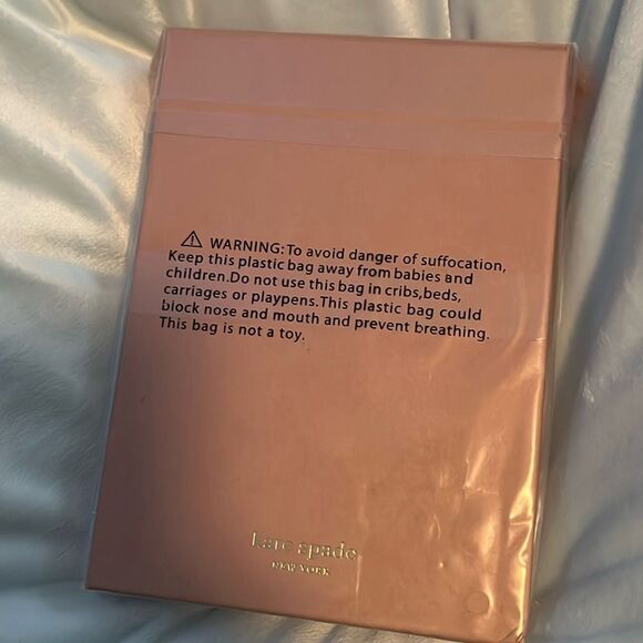 KATE SPADE
NEW YORK
DESKTOP NOTEPAD - Picture 5 of 6